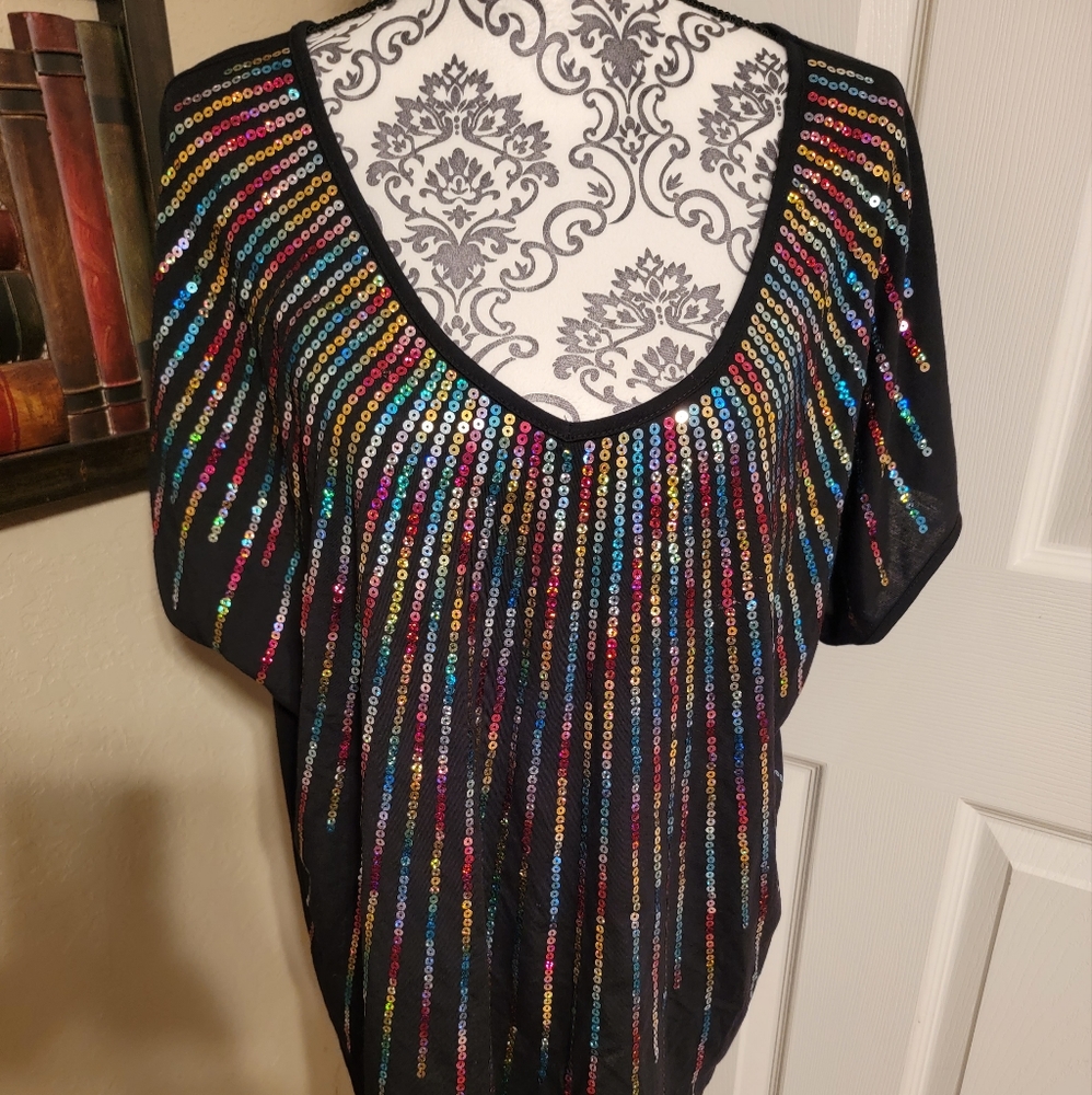 Womens shirt w/multi color sequins.